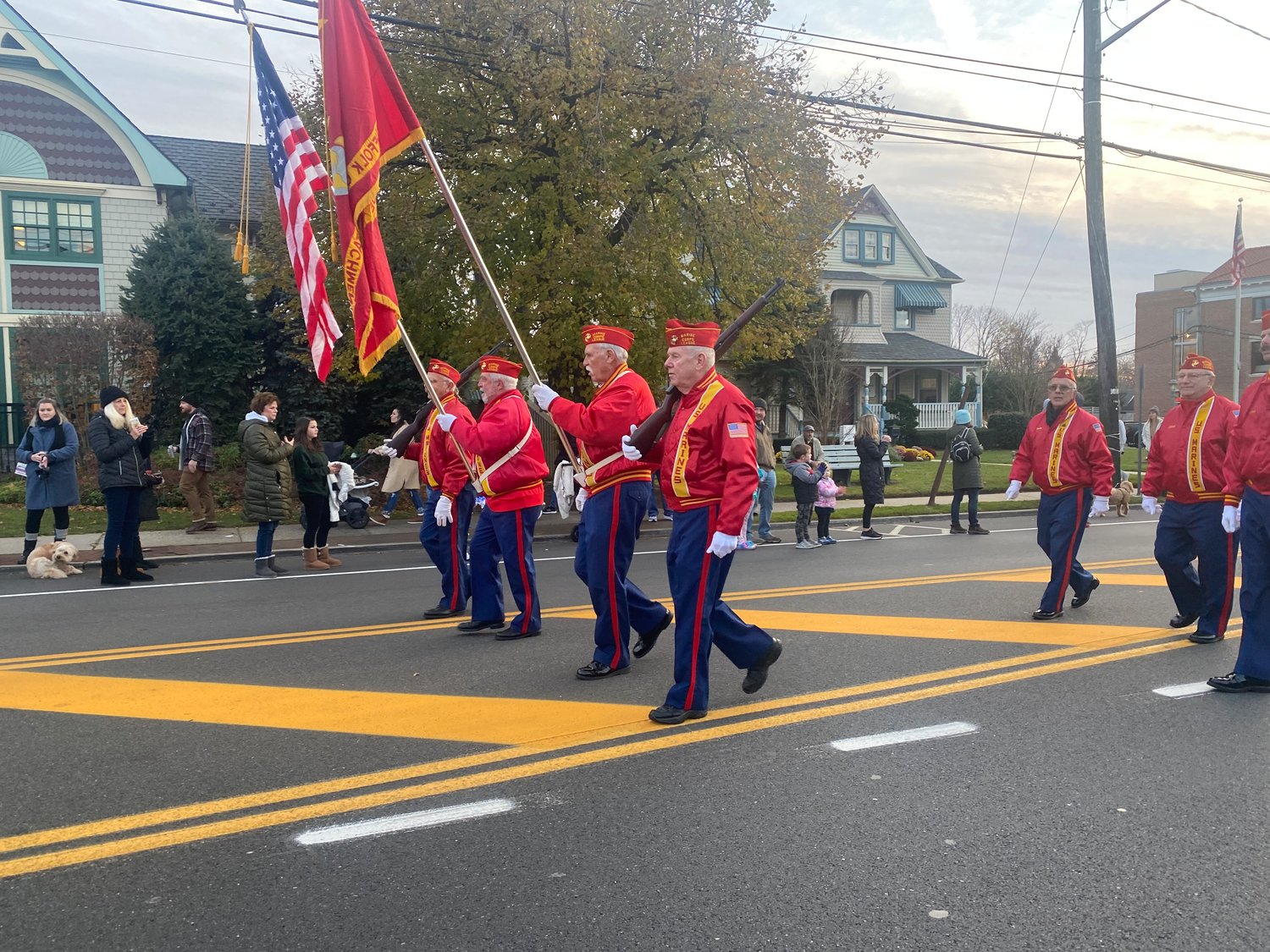 Veterans from the Marines march at the front of the parade.